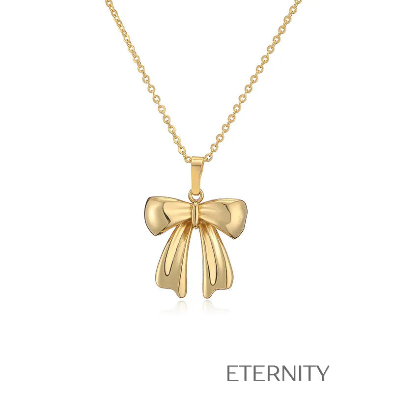 Colección de Collares Enchanted Bow con Dijes de Lazo en Perlas y Oro  Cadenas Dorado Unica Acero Inoxidable  ETERNITY