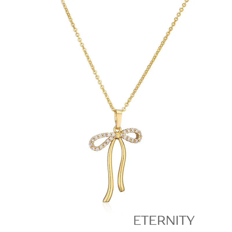 Colección de Collares Enchanted Bow con Dijes de Lazo en Perlas y Oro  Cadenas Dorado Unica Acero Inoxidable  ETERNITY