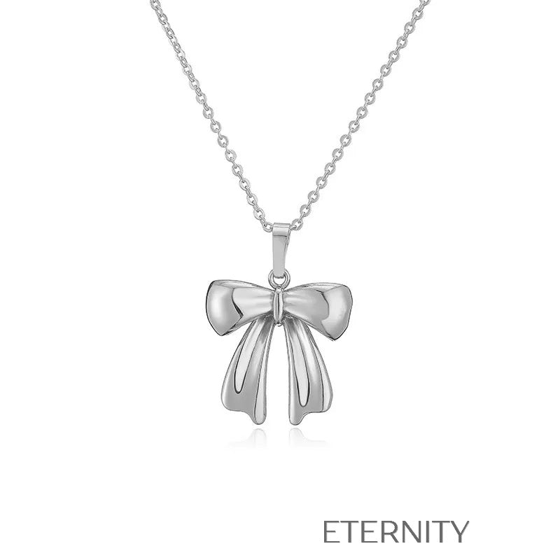 Colección de Collares Enchanted Bow con Dijes de Lazo en Perlas y Oro  Cadenas Dorado Unica Acero Inoxidable  ETERNITY