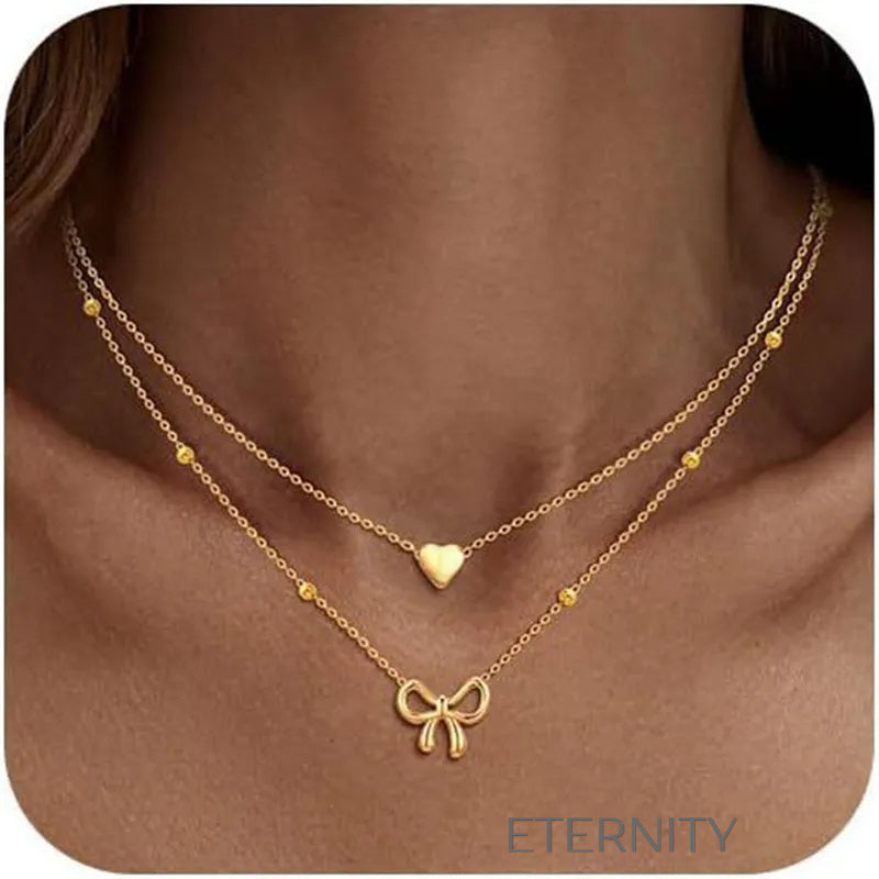 Collar Doble Coquette Love Corazón y Lazo  Cadenas Dorado Unica Acero Inoxidable  ETERNITY