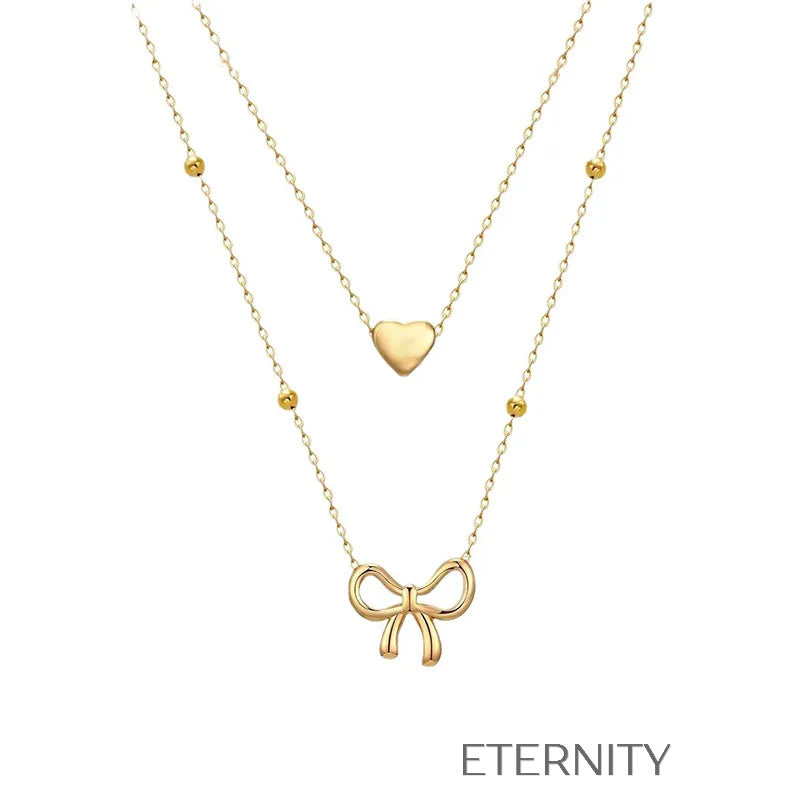 Collar Doble Coquette Love Corazón y Lazo  Cadenas Dorado Unica Acero Inoxidable  ETERNITY