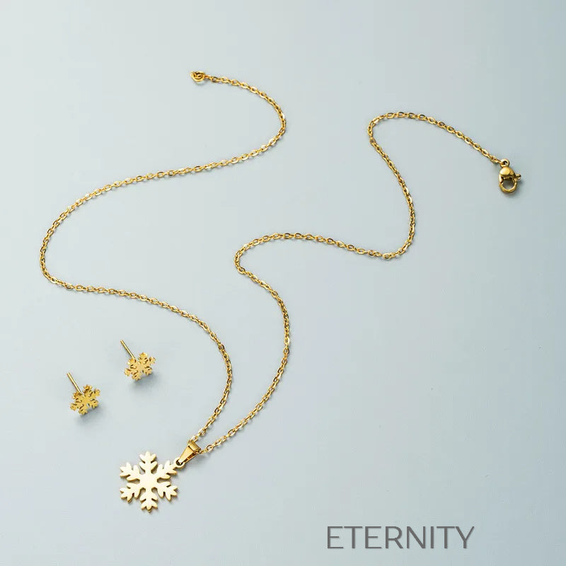 Set de Joyería Winter Frost con Collar y Zarcillos de Copo de Nieve en Oro  Set Dorado Unica Acero Inoxidable  ETERNITY