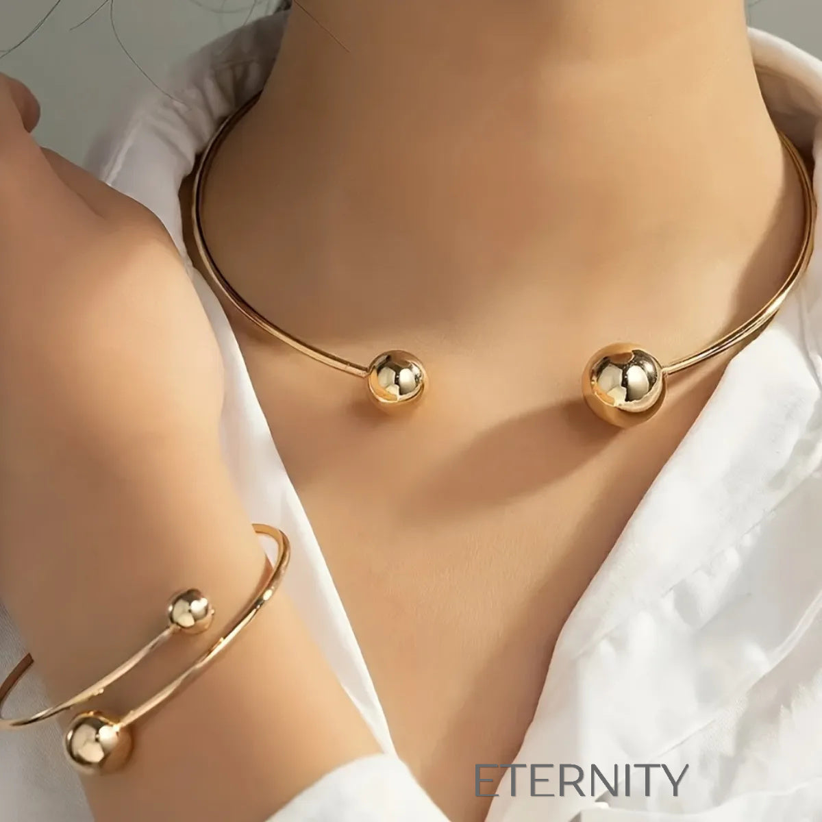 Conjunto Orbital Harmony de Gargantilla y Pulsera Rígida con Esferas en Acero  Set Dorado Unica Acero Inoxidable  ETERNITY