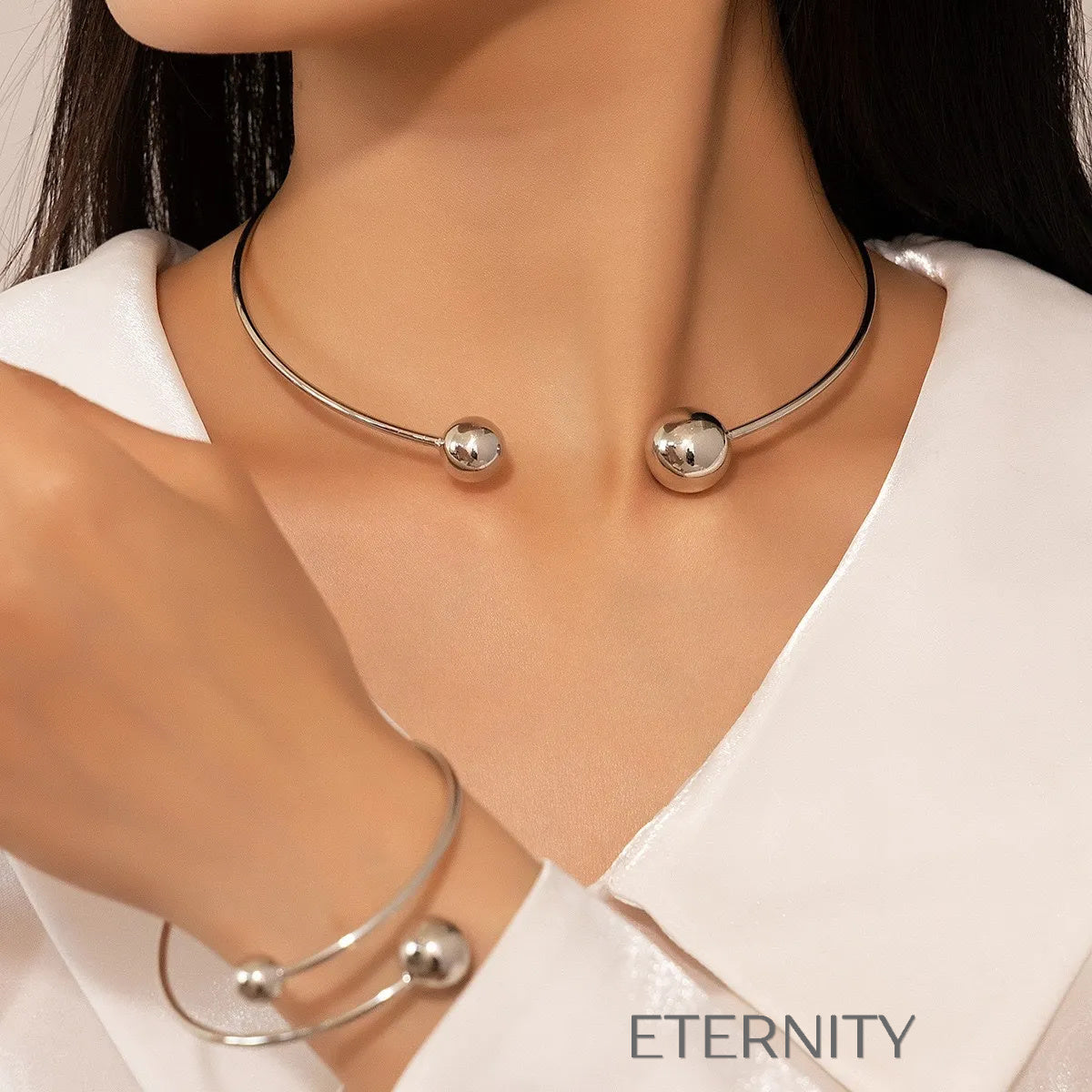 Conjunto Orbital Harmony de Gargantilla y Pulsera Rígida con Esferas en Acero  Set Dorado Unica Acero Inoxidable  ETERNITY