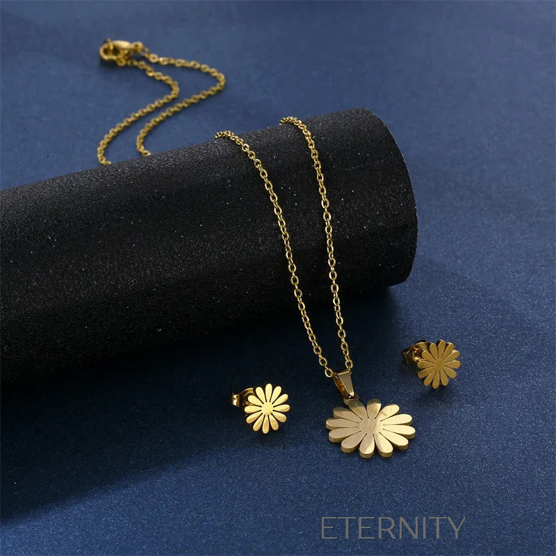Conjunto Daisy Bloom de Collar y Zarcillos  Set Dorado Unica Acero Inoxidable  ETERNITY
