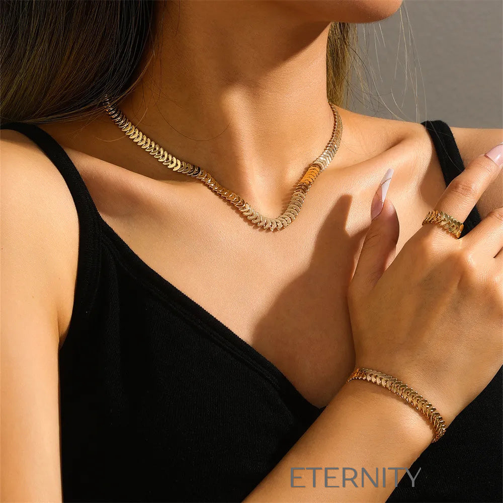 Conjunto Chevron Serpent de Escamas Articuladas  Set Dorado Unica Acero Inoxidable  ETERNITY