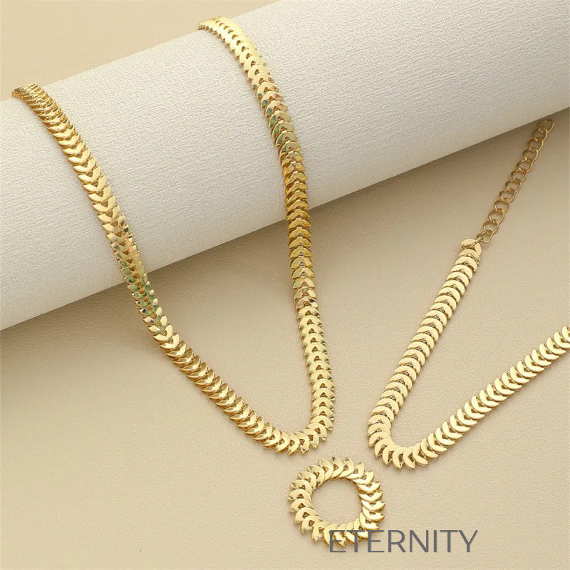 Conjunto Chevron Serpent de Escamas Articuladas  Set Dorado Unica Acero Inoxidable  ETERNITY