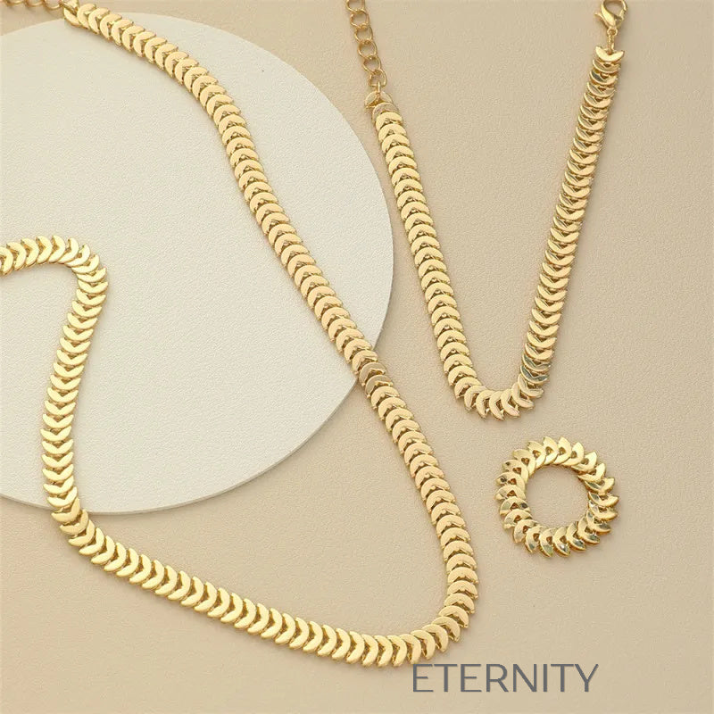 Conjunto Chevron Serpent de Escamas Articuladas  Set Dorado Unica Acero Inoxidable  ETERNITY