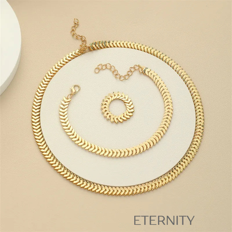 Conjunto Chevron Serpent de Escamas Articuladas  Set Dorado Unica Acero Inoxidable  ETERNITY