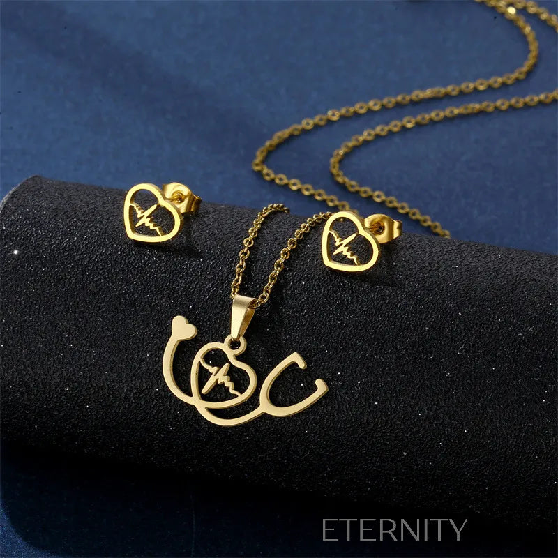 Sets Identity de Collar y Zarcillos en Acero Dorado  Set Dorado Unica Acero Inoxidable  ETERNITY