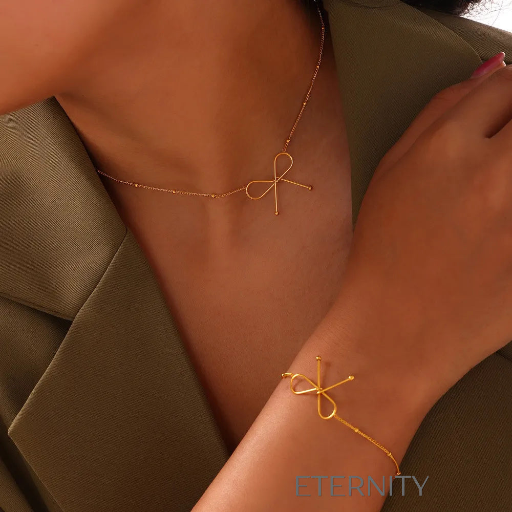 Set de Joyería Eternal Bow con Collar Pulsera y Zarcillos en Oro y Plata  Set Dorado Unica Acero Inoxidable  ETERNITY