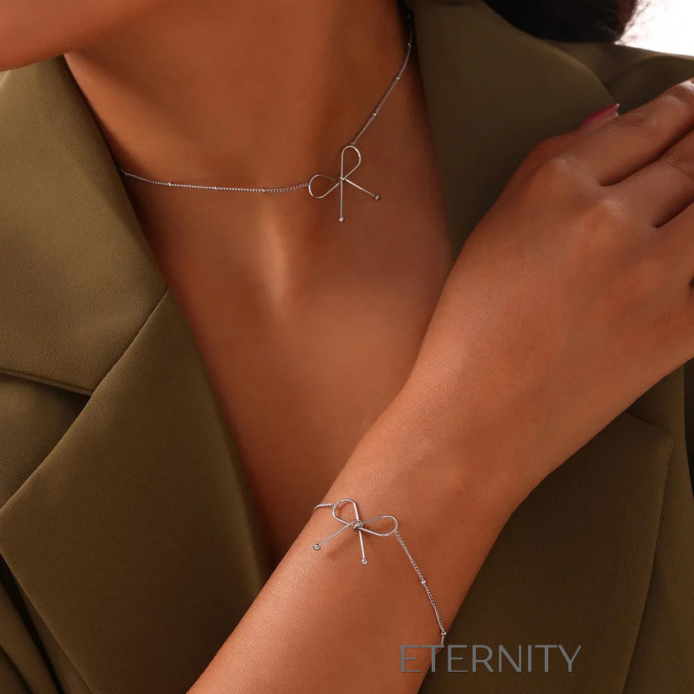 Set de Joyería Eternal Bow con Collar Pulsera y Zarcillos en Oro y Plata  Set Dorado Unica Acero Inoxidable  ETERNITY