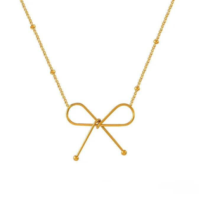 Set de Joyería Eternal Bow con Collar Pulsera y Zarcillos en Oro y Plata  Set Dorado Unica Acero Inoxidable  ETERNITY