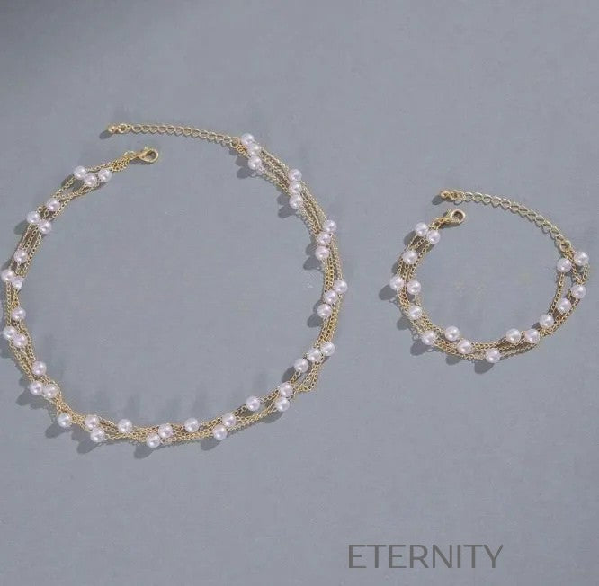 Conjunto "Pearly Cascade" de Collar y Pulsera Multicapa con Perlas en Oro ETERNITY