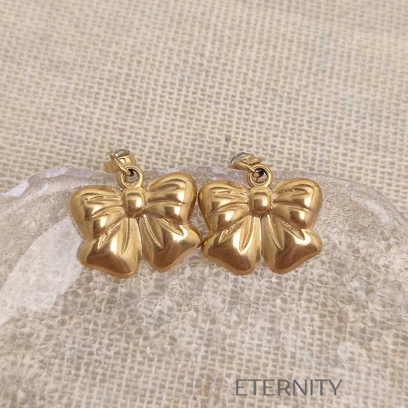 Set de Collar y Zarcillos Charming Bow con Diseño de Lazo Escultural  Set Dorado Unica Acero Inoxidable  ETERNITY