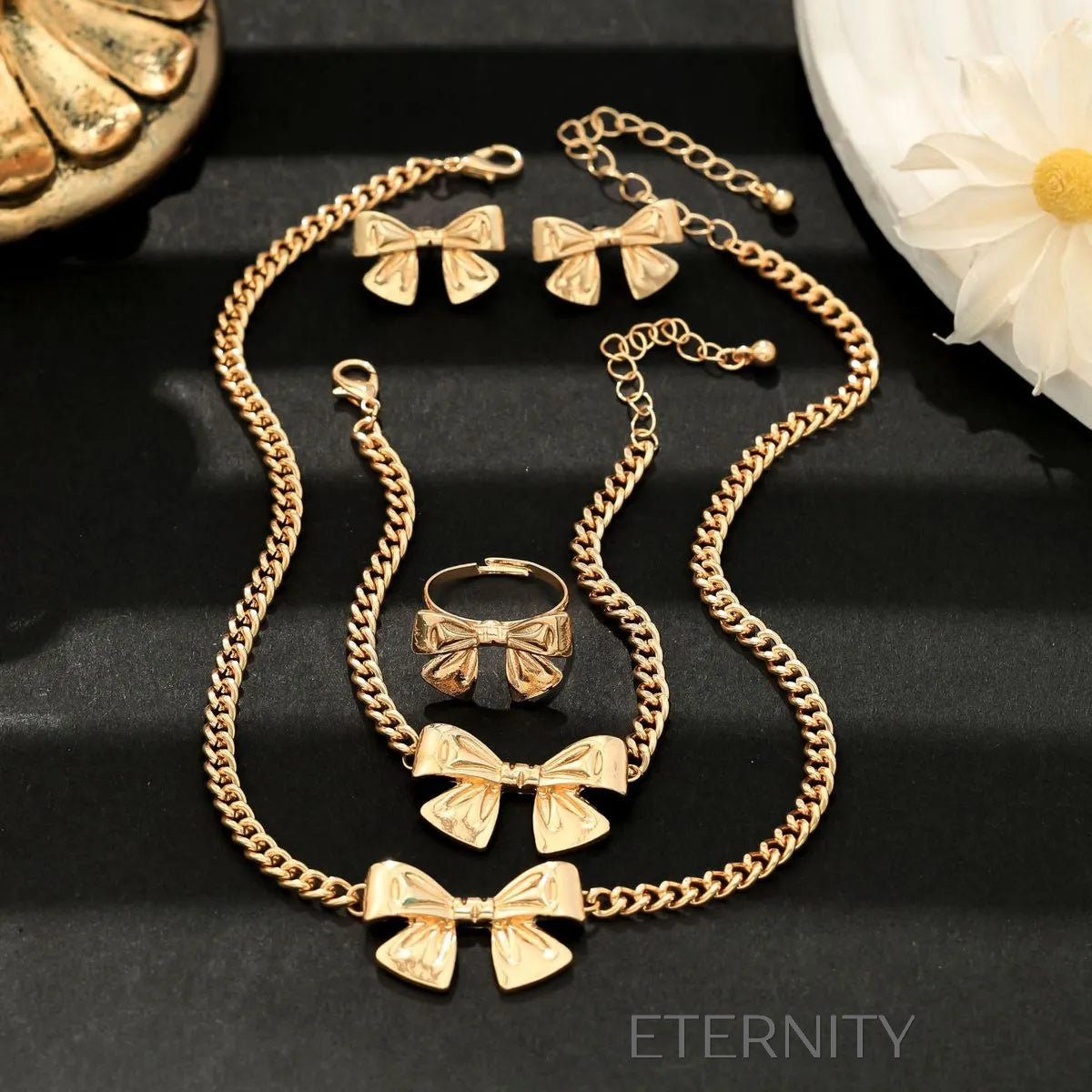 Conjunto Coquette Ribbon Lazos Dorados  Set Dorado Unica Acero Inoxidable  ETERNITY