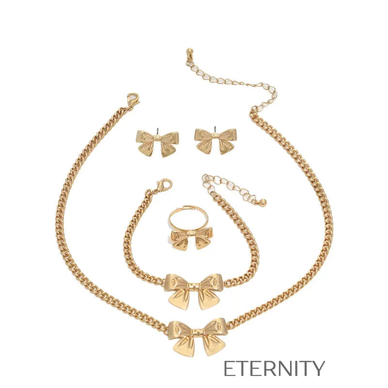Conjunto Coquette Ribbon Lazos Dorados  Set Dorado Unica Acero Inoxidable  ETERNITY