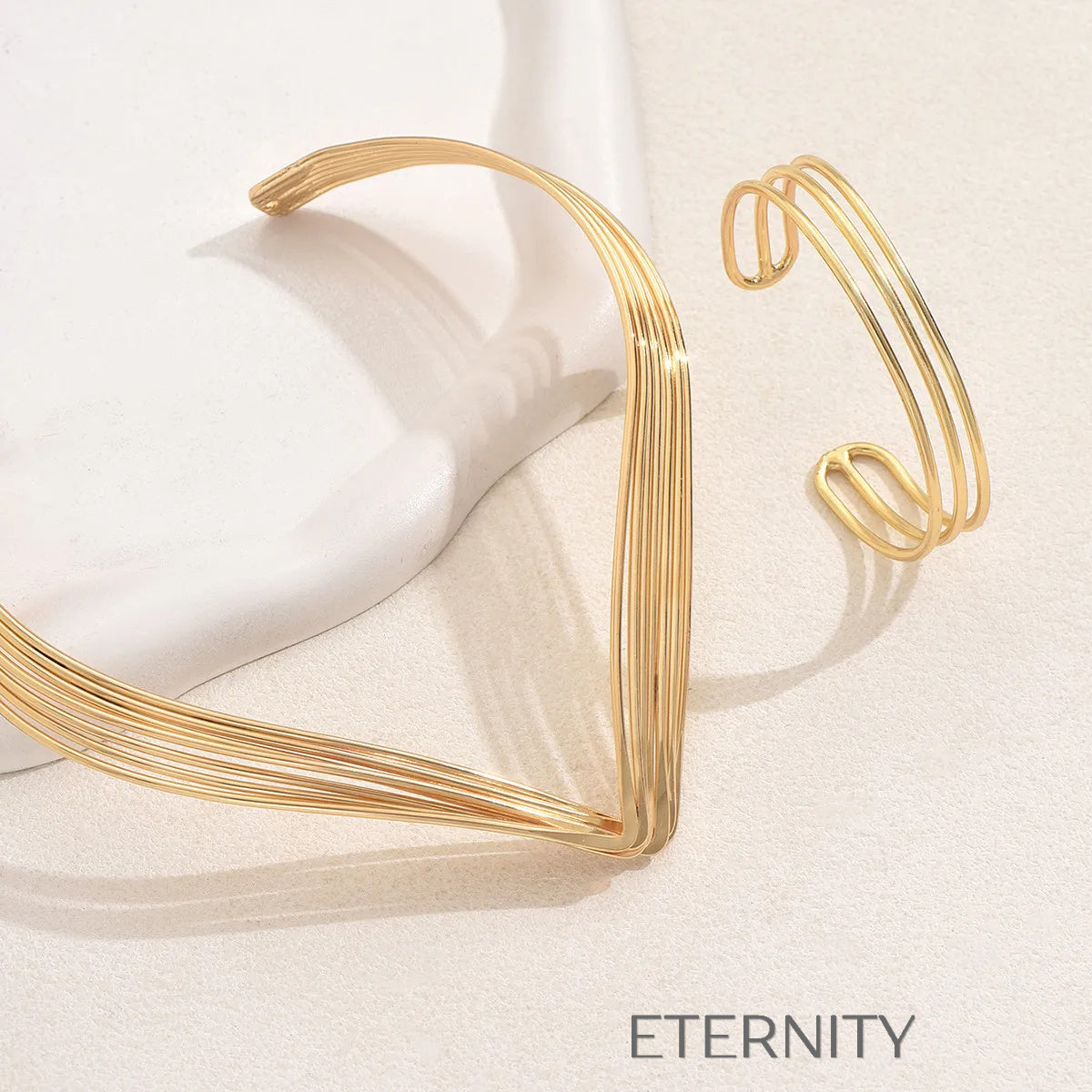 Set dorado y plateado de collar y brazalete en múltiples hileras elegantes Set Dorado Unica Acero Inoxidable  ETERNITY