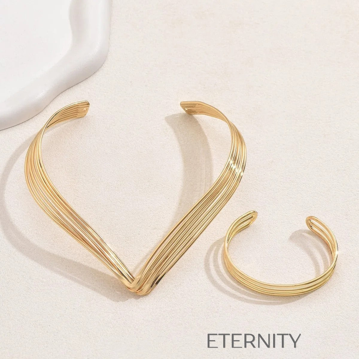Set dorado y plateado de collar y brazalete en múltiples hileras elegantes Set Dorado Unica Acero Inoxidable  ETERNITY