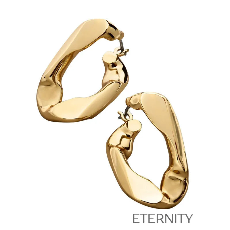 Zarcillos Aro Ethereal Flow  Zarcillos Dorado Unica Acero Inoxidable  ETERNITY