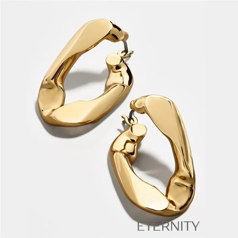 Zarcillos Aro Ethereal Flow  Zarcillos Dorado Unica Acero Inoxidable  ETERNITY