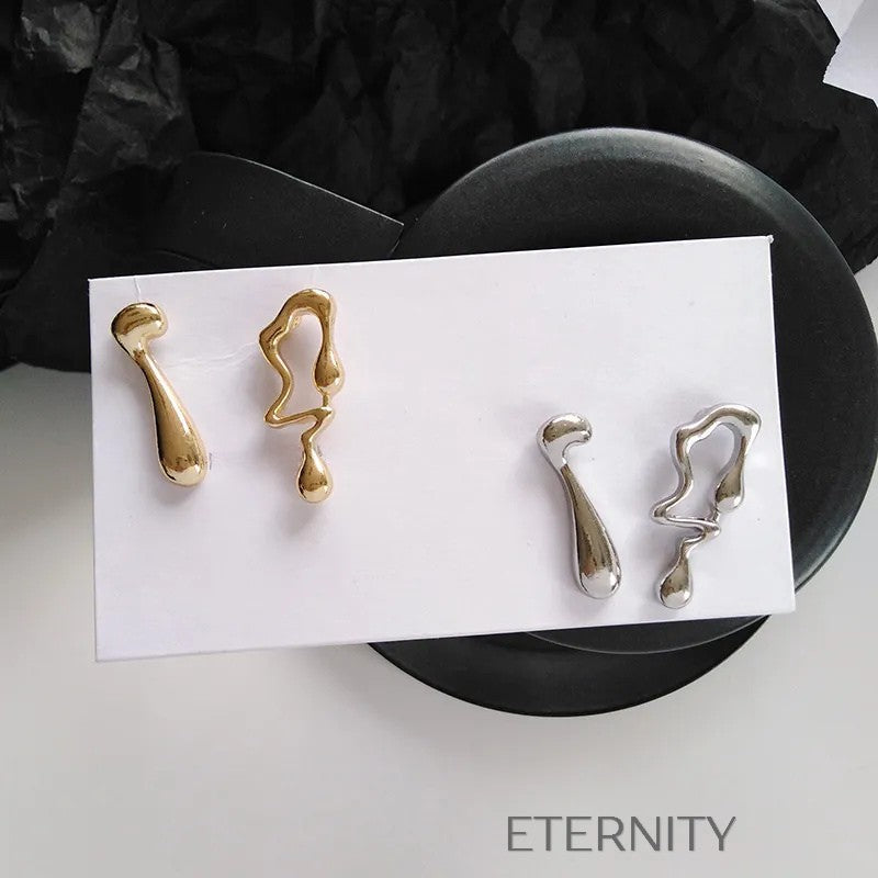 Zarcillos Liquid Essence Oro  Zarcillos Dorado Unica Acero Inoxidable  ETERNITY