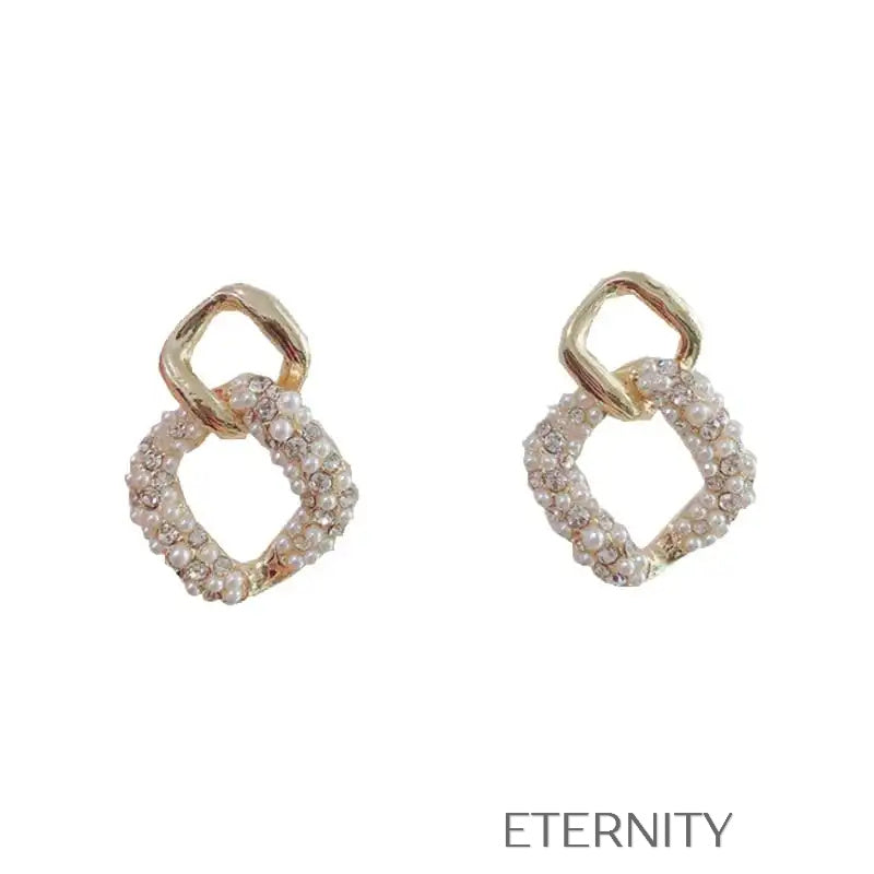 Zarcillos Nacre Luxe de Eslabón y Perlas  Zarcillos Dorado Unica Acero Inoxidable  ETERNITY