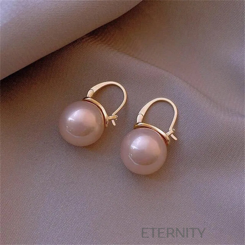 Zarcillos de Perla Esférica Champagne Pink y White  Zarcillos Champagne Unica Acero Inoxidable  ETERNITY