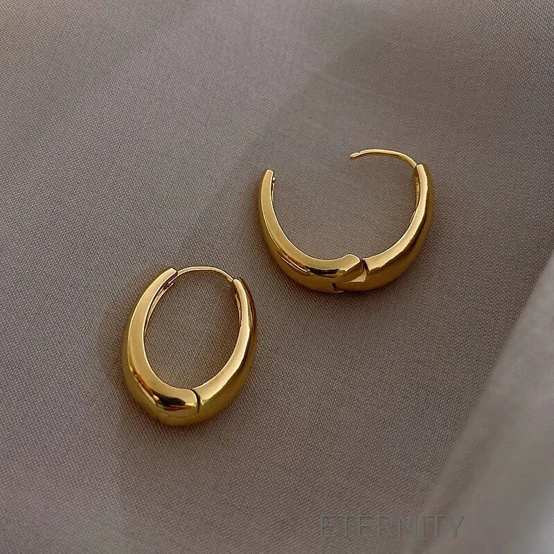 Zarcillos de Aro Ethereal Oval con Diseño Ergonómico y Acabado Espejo  Zarcillos Dorado Unica Acero Inoxidable  ETERNITY