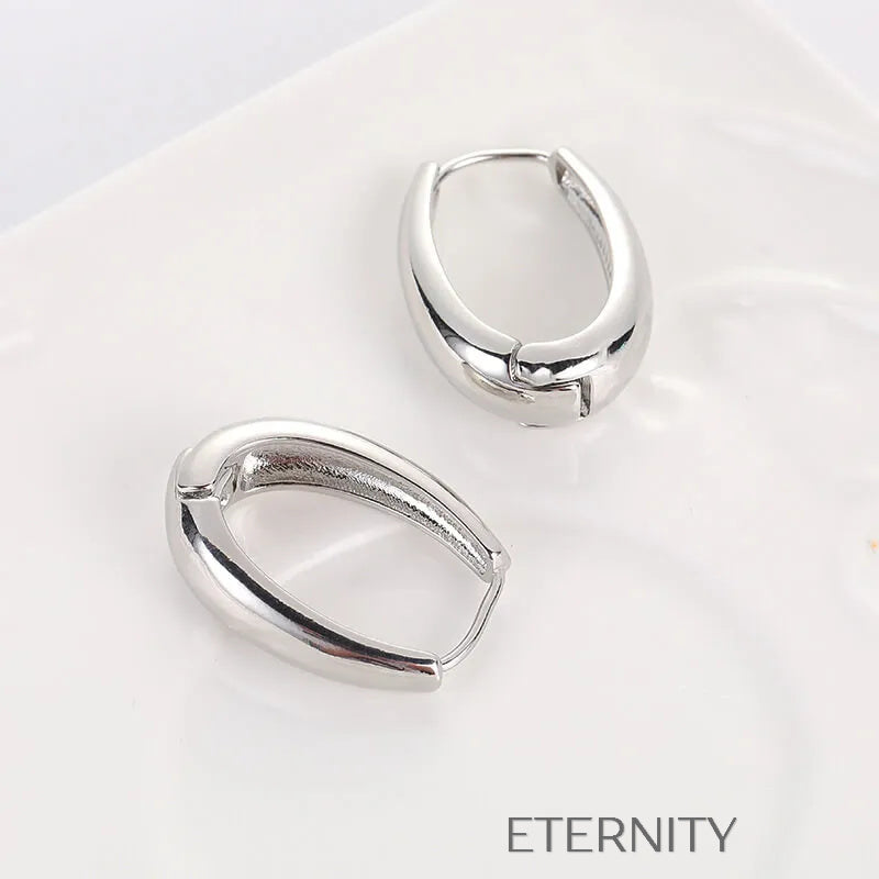 Zarcillos de Aro Ethereal Oval con Diseño Ergonómico y Acabado Espejo  Zarcillos Dorado Unica Acero Inoxidable  ETERNITY
