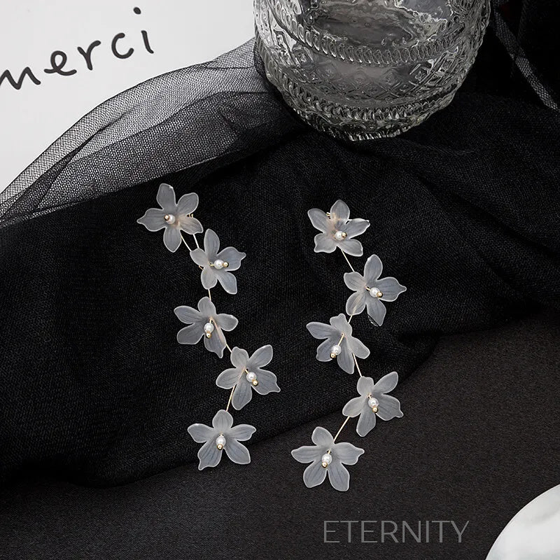 Zarcillos Flora Glass de Flores Mate  Zarcillos Blanco Unica Acero Inoxidable  ETERNITY
