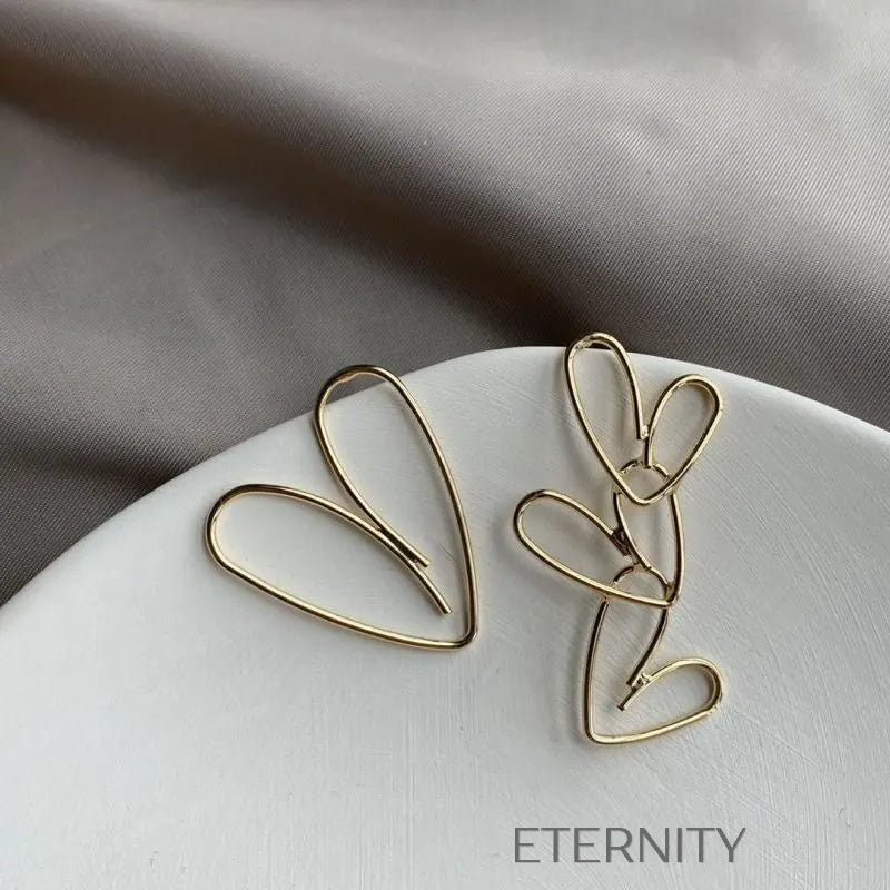 Zarcillos Linear Heart  Zarcillos Dorado Unica Acero Inoxidable  ETERNITY