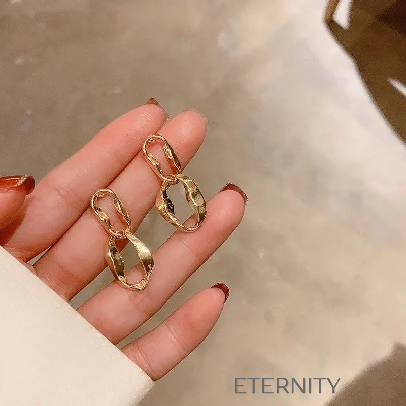 Zarcillos Interlock Link  Zarcillos Dorado Unica Acero Inoxidable  ETERNITY