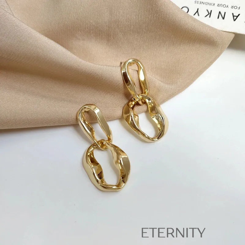 Zarcillos Interlock Link  Zarcillos Dorado Unica Acero Inoxidable  ETERNITY