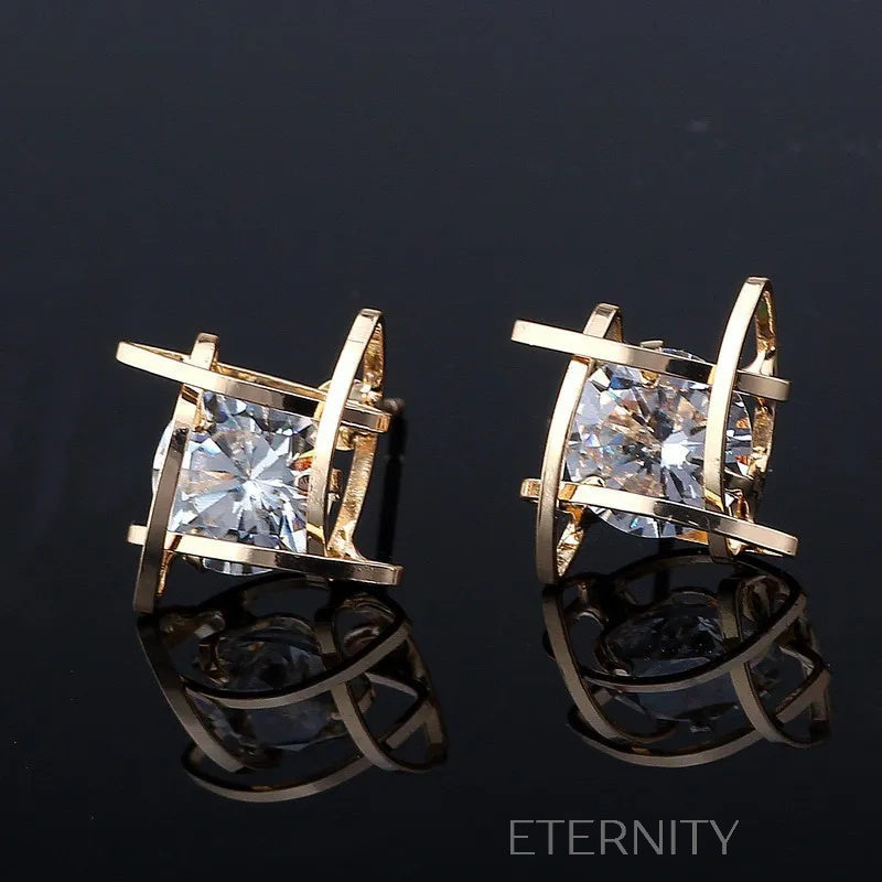 Zarcillos de Botón con Circones y Estructura Geométrica  Zarcillos Dorado Unica Acero Inoxidable  ETERNITY