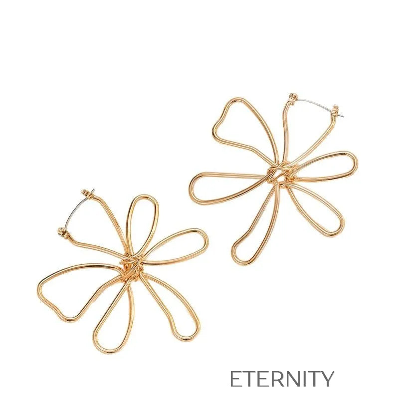 Aretes dorados con diseño artístico floral Zarcillos Dorado Unica Acero Inoxidable  ETERNITY