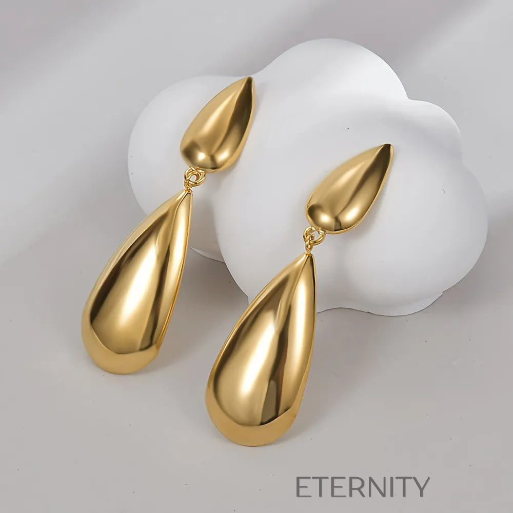 Zarcillos Liquid Drop Largos  Zarcillos Dorado Unica Acero Inoxidable  ETERNITY