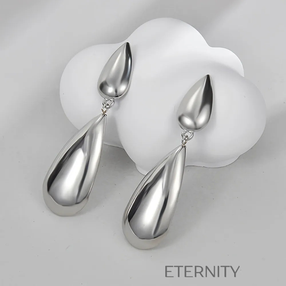 Zarcillos Liquid Drop Largos  Zarcillos Dorado Unica Acero Inoxidable  ETERNITY