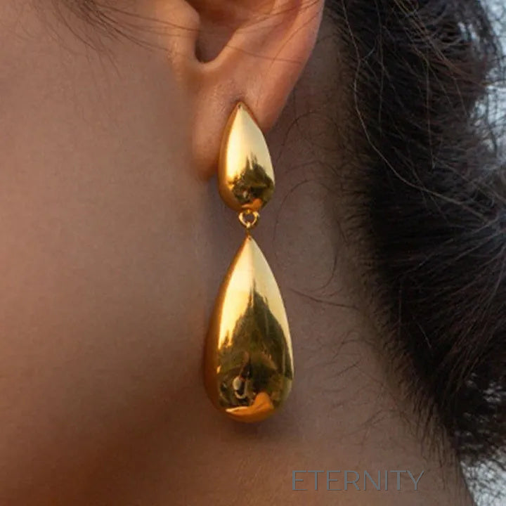 Zarcillos Liquid Drop Largos  Zarcillos Dorado Unica Acero Inoxidable  ETERNITY