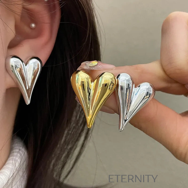 Zarcillos Puffy Heart de Botón con Diseño de Corazón Alargado en Oro y Plata  Zarcillos Dorado Unica Acero Inoxidable  ETERNITY