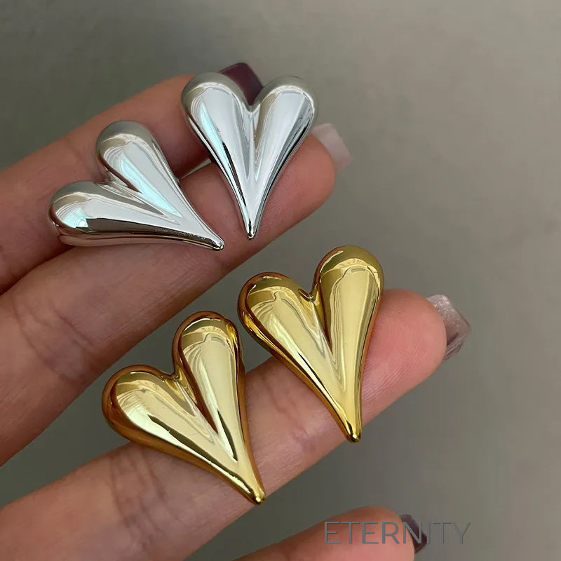 Zarcillos Puffy Heart de Botón con Diseño de Corazón Alargado en Oro y Plata  Zarcillos Dorado Unica Acero Inoxidable  ETERNITY