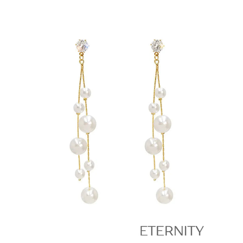 Zarcillos Largos en Cascada con Perlas de Diferentes Tamaños  Zarcillos Dorado Unica Acero Inoxidable  ETERNITY