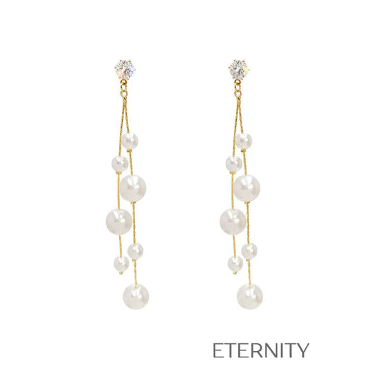 Zarcillos Largos en Cascada con Perlas de Diferentes Tamaños  Zarcillos Dorado Unica Acero Inoxidable  ETERNITY