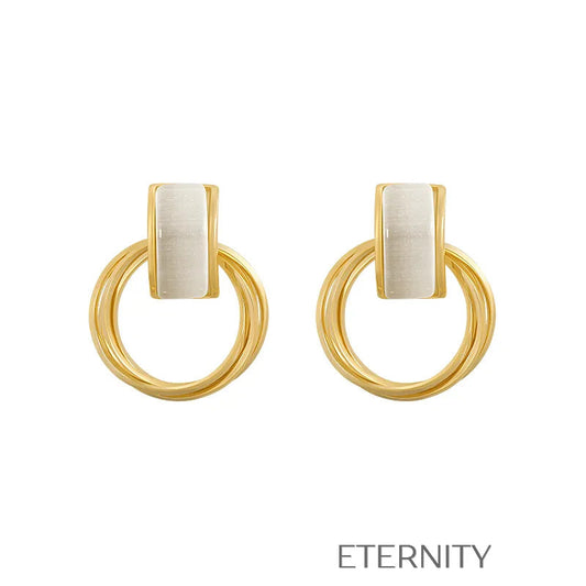 Zarcillos Pearl & Loop con Aros Entrelazados y Detalle en Marfil  Zarcillos Dorado Unica Acero Inoxidable  ETERNITY