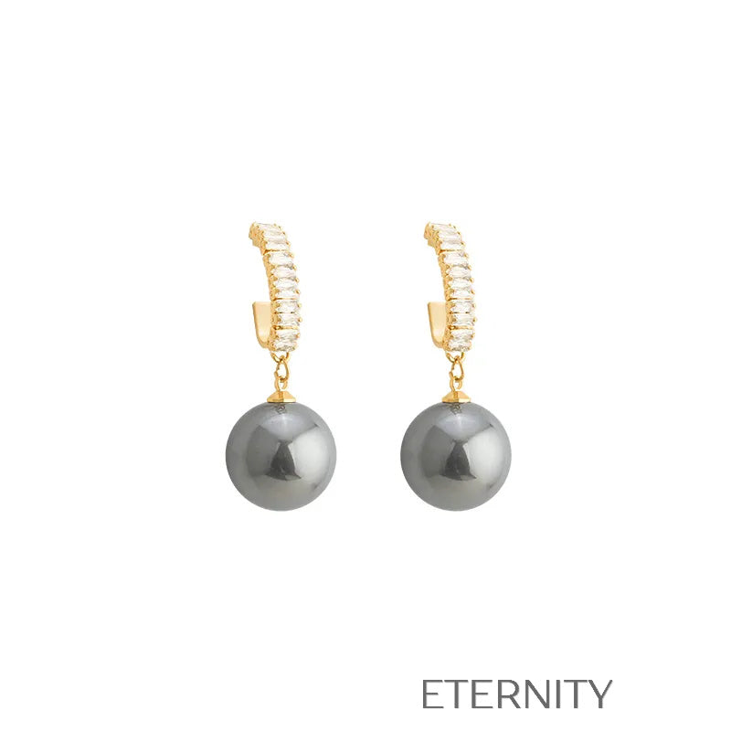 Zarcillos Nacre Sparkle con Perlas  Zarcillos Champagne Perla Unica Acero Inoxidable  ETERNITY