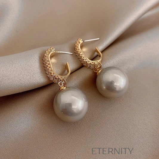 Zarcillos Nacre Sparkle con Perlas  Zarcillos Champagne Perla Unica Acero Inoxidable  ETERNITY