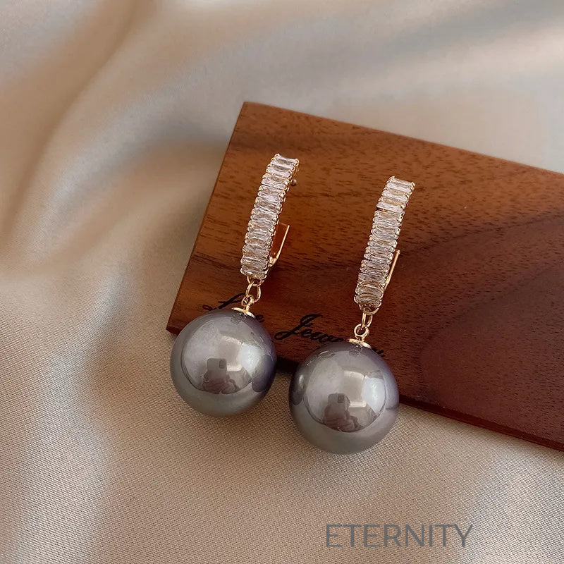 Zarcillos Nacre Sparkle con Perlas  Zarcillos Champagne Perla Unica Acero Inoxidable  ETERNITY
