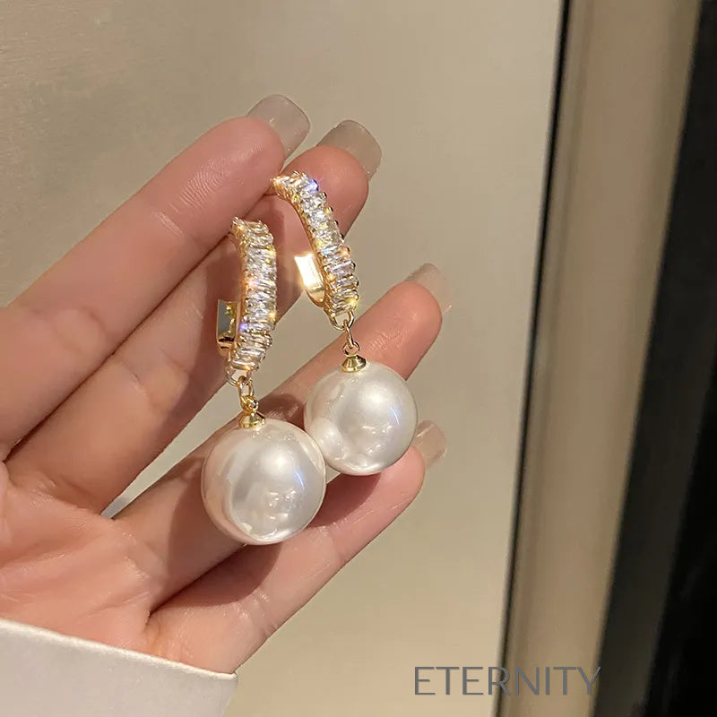 Zarcillos Nacre Sparkle con Perlas  Zarcillos Champagne Perla Unica Acero Inoxidable  ETERNITY