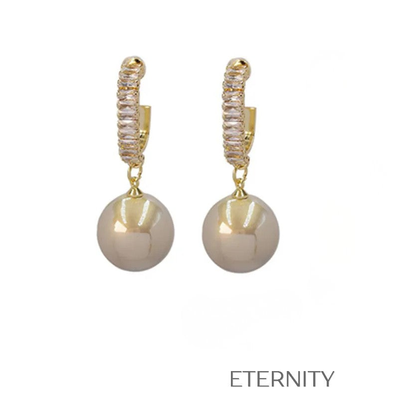 Zarcillos Nacre Sparkle con Perlas  Zarcillos Champagne Perla Unica Acero Inoxidable  ETERNITY