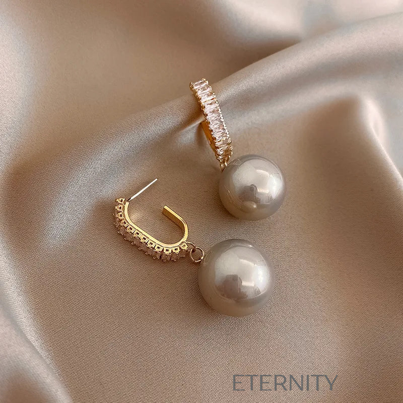 Zarcillos Nacre Sparkle con Perlas  Zarcillos Champagne Perla Unica Acero Inoxidable  ETERNITY